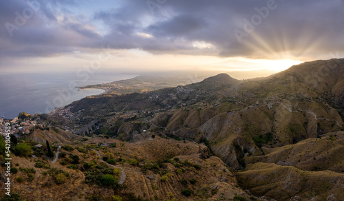 Aerial view of Castelmola and Gulf of Catania at sunset,  Messina, Sicily, Italy photo