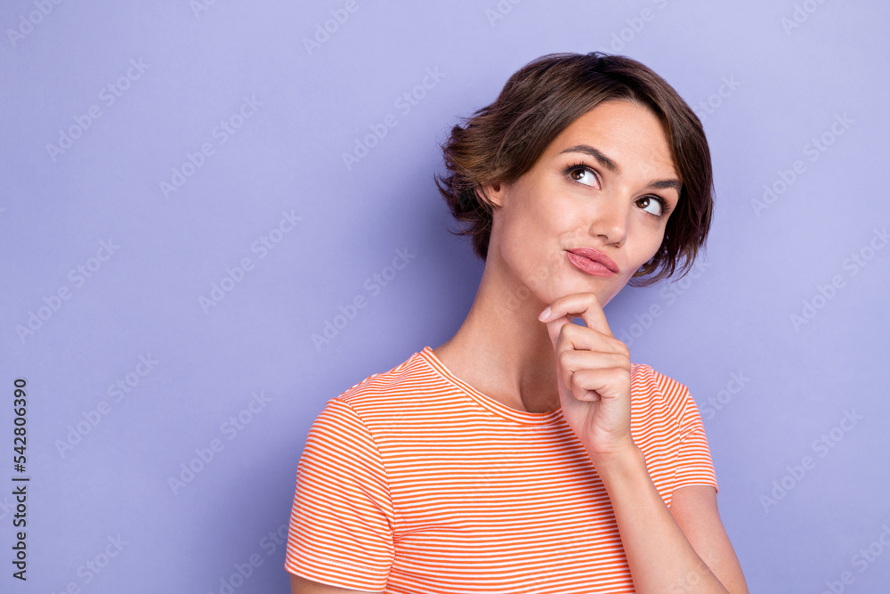 Closeup photo of young cute face minded girl touch chin idea thoughtful genius pouted lips advertisement offer curious empty space isolated on violet color background Closeup photo of young cute face minded girl touch chin idea thoughtful genius pouted lips advertisement offer curious empty space isolated on violet color background
