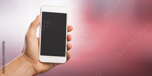 Hand of person hold phone with a blank screen