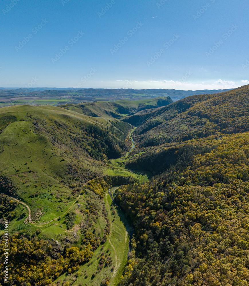Romania - Typical Transylvanian highlands with colorful leaves from a drone