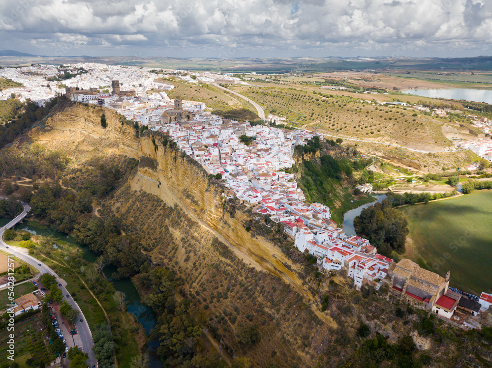 View of Arcos de la Frontera city on towering vertical cliffs, Andalusia, Spain