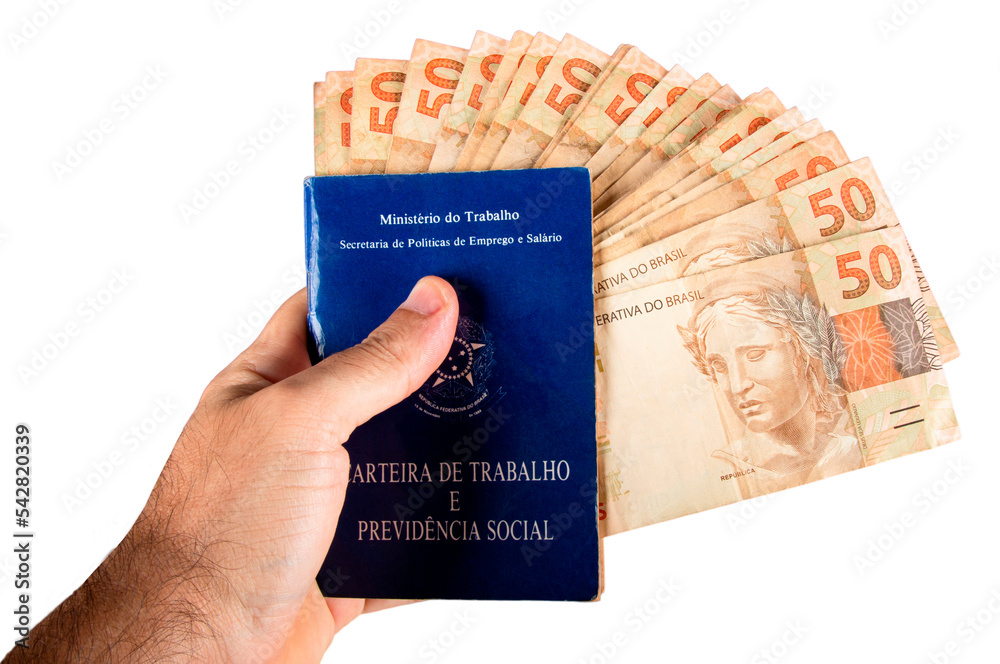 Fototapeta premium Hand holding Brazilian work card and social security with Brazilian money banknotes. png transparent background