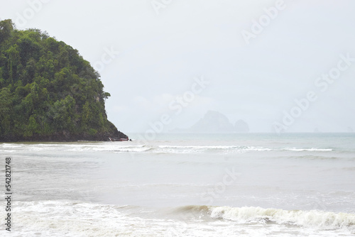 Waves and beach in rainy day at Ao Nang   photo