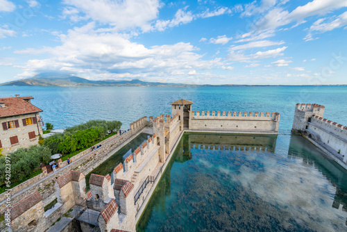 Fototapeta Naklejka Na Ścianę i Meble -  View of the medieval old town and Lake Garda from the Scaligero Castle in the Italian resort town of Sirmione, Italy.	