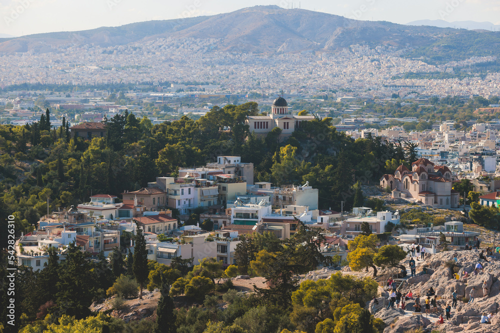 Fototapeta premium Athens, Attica, beautiful super-wide angle view of Athens city, Greece, Mount Lycabettus, mountains and scenery beyond the city, seen from The Parthenon, temple on the Athenian Acropolis