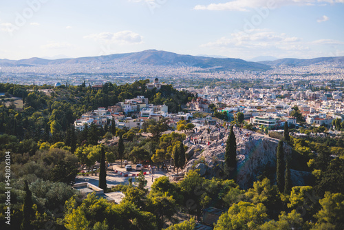 Athens, Attica, beautiful super-wide angle view of Athens city, Greece, Mount Lycabettus, mountains and scenery beyond the city, seen from The Parthenon, temple on the Athenian Acropolis photo