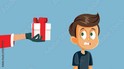 Disappointed Boy Receiving a Lousy Gift from Santa Vector Cartoon. Unhappy child reacting to a bad present from Santa

