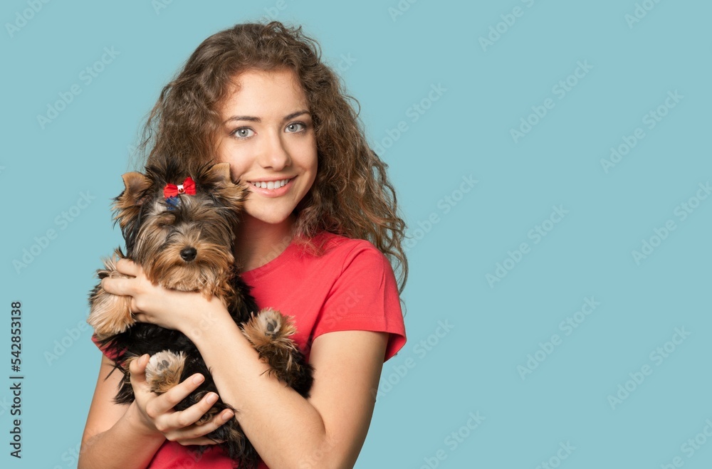 Pets concept. Young owner with cute dog Pets concept. Young owner with cute dog