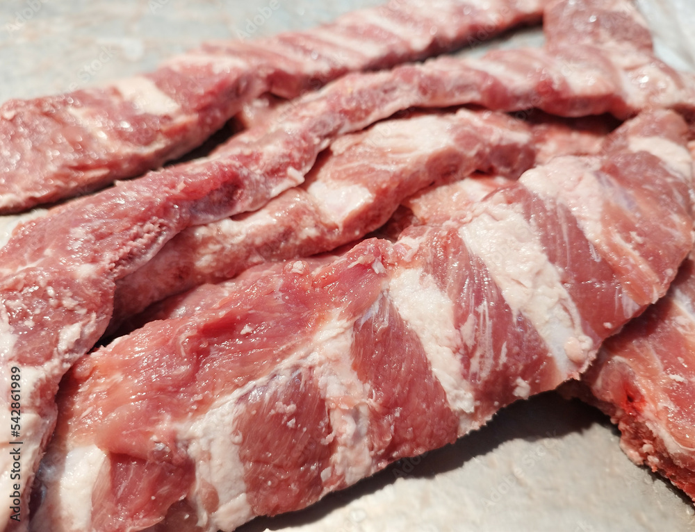 Fresh Pork Spare Rib. Raw pork ribs, Spare Ribs come from organic farms. Piece of fresh raw meat.