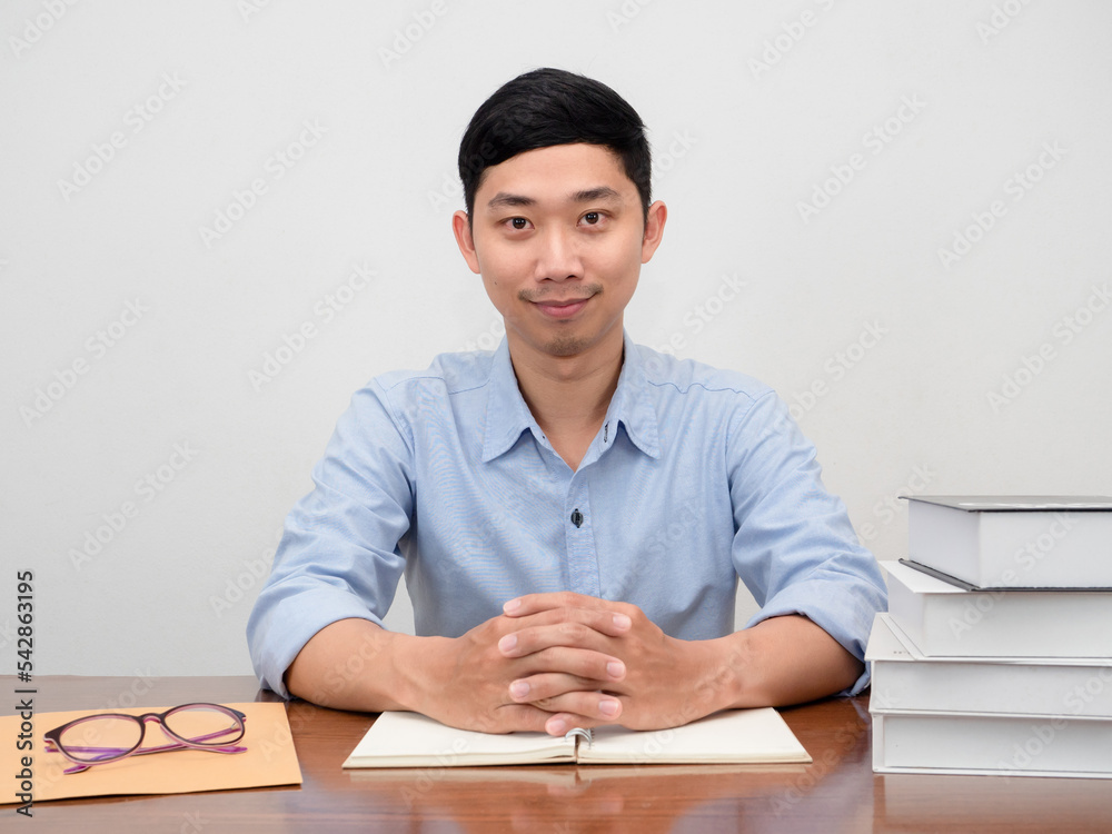 Handsome businessman sit at working table confident smile Handsome businessman sit at working table confident smile