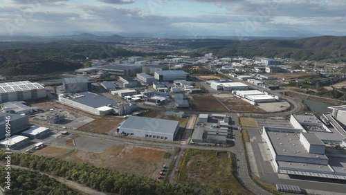 Hyperlapse: Circling around clouds moving over industrial facility