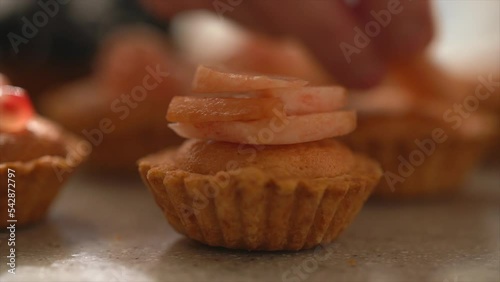 some peach tarts on the table