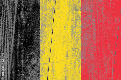 Belgium flag painted on a damaged old wooden background © Xookits