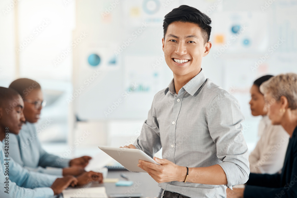 © C D/peopleimages.com - Workshop, portrait and businessman with a tablet in a meeting for planning, strategy and collaboration at work. Smile, digital and corporate Asian worker typing on technology during a seminar