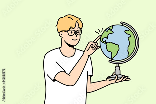 Smiling guy in glasses spin glove with finger. Smart boy child in spectacles show country on sphere. Education concept. Vector illustration. 