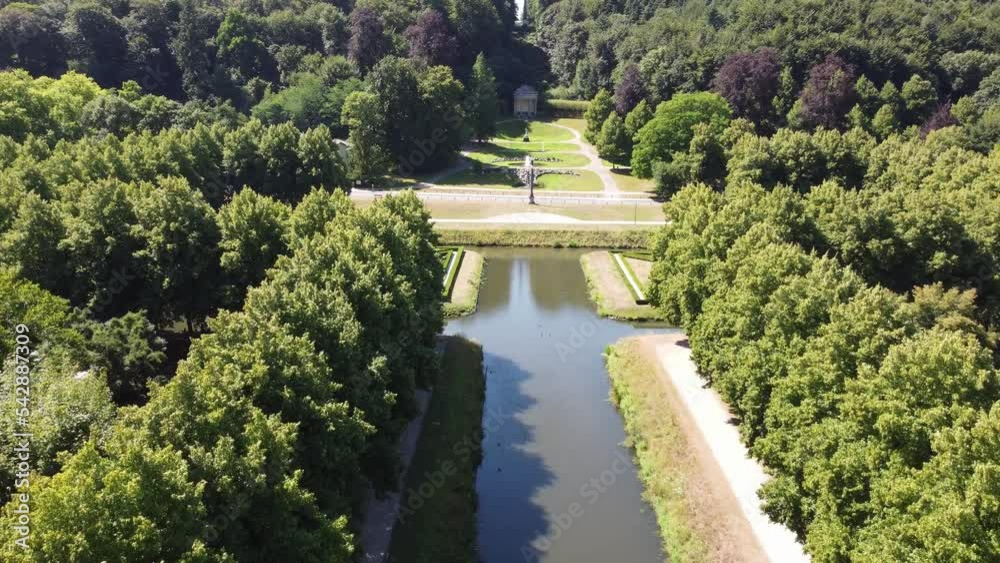 Aerial video of nature's park in Kleve, Germany covering blue water channels, fountains and