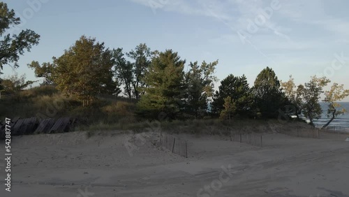 Rising Motion with Drone. Fall Foliage in reds and golds in Grand Haven. photo