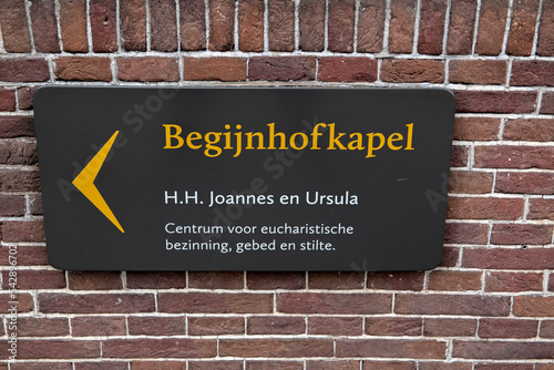 Direction Begijnhofkapel Sign At Amsterdam The Netherlands 2020 photo