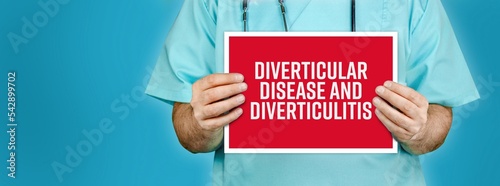 Diverticular disease and diverticulitis. Doctor shows red sign with medical word on it. Blue background. photo