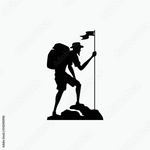 silhouette of old man hiker having fun celebrating success on top of hill by planting flag.