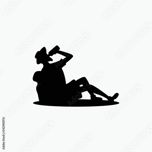 silhouette of old man hiker resting drinking water.