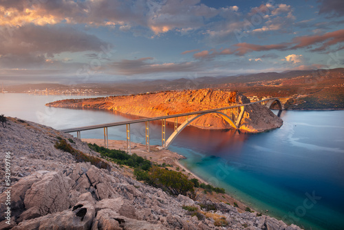 Obraz na płótnie Krk Bridge, Croatia. Image of Krk Bridge which connects the Croatian island of Krk with the mainland at beautiful summer sunset. w salonie