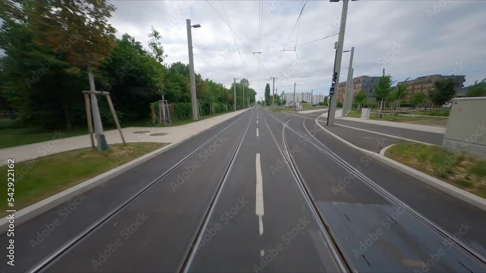 Dollyshot down the Domenico dell'Allio Allee towards Reininghaus Station and Tram remise Graz, Styria, Austria by aerial fpv drone 60fps stable Dollyshot down the Domenico dell'Allio Allee towards Reininghaus Station and Tram remise Graz, Styria, Austria by aerial fpv drone 60fps stable