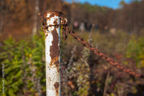 Rusted metal fence chain