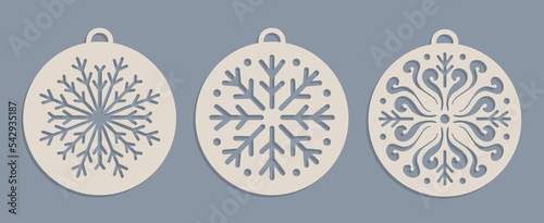 Set of Laser cut Christmas baubles Templates. Christmas tree wood decorations balls with snowflakes