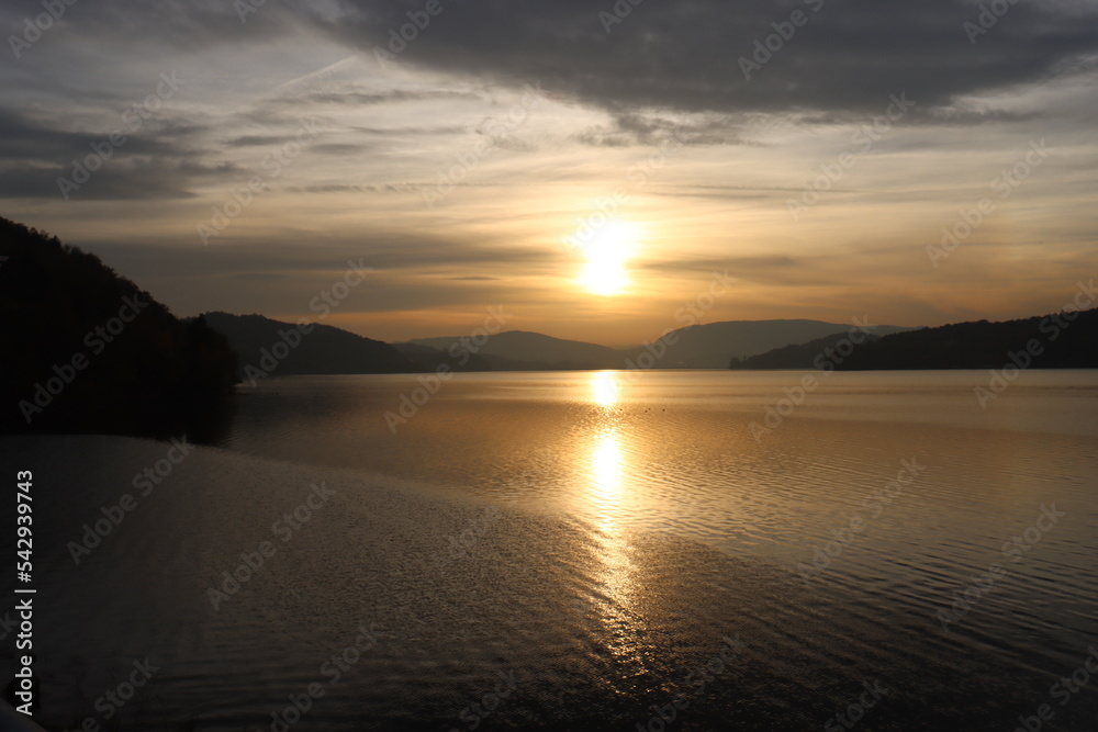 jetty at sunset beautiful lake and subdued sunlight