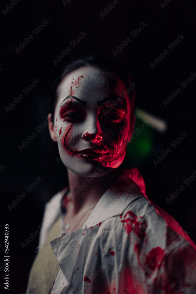 Portrait of young woman in image bloodthirsty zombie with horror wounds and bloody clothes. Portrait of young woman in image bloodthirsty zombie with horror wounds and bloody clothes.
