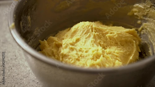 a bowl of dough on table