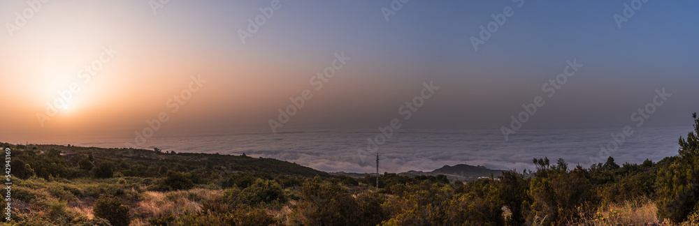 summer panorama of a valley covered with clouds at sunset on tenerife