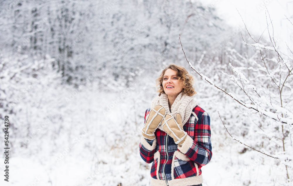Fototapeta premium this winter holiday is perfect. time for vacation relax. best place to feel freedom. woman enjoy winter landscape of snowy forest. female winter fashion. my favorite season. happy weather
