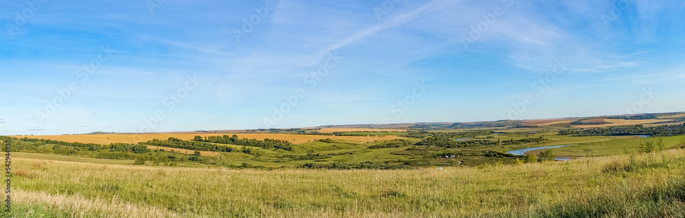 Panoramic photo of the landscape from the elevation to the floodplain of the river.
