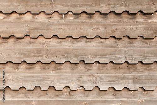 Wooden wall with decorative pattern, background texture