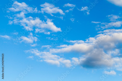 Blue sky with white clouds. Natural background photo