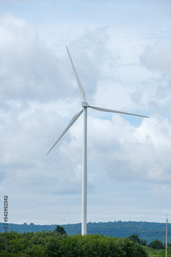 Tall windmills in the middle of nature in Thailand Tall windmills in the middle of nature in Thailand
