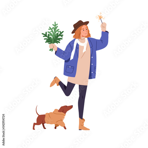Happy woman walking with dog at Christmas eve. Young girl with festive Xmas s...