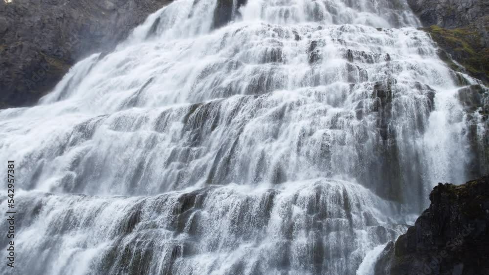 Huge cascade of water in the mountains, Beautiful and magical nature landscape, Waterfall in Iceland, aerial view 4k Huge cascade of water in the mountains, Beautiful and magical nature landscape, Waterfall in Iceland, aerial view 4k