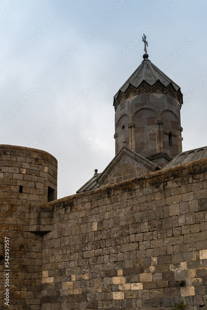 Armenia, Tatev, September 2022. Fortress wall and church tower.