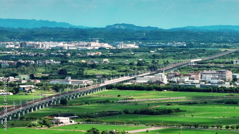 Aerial view of a train on the railroad and high speed rail ,Taiwan.