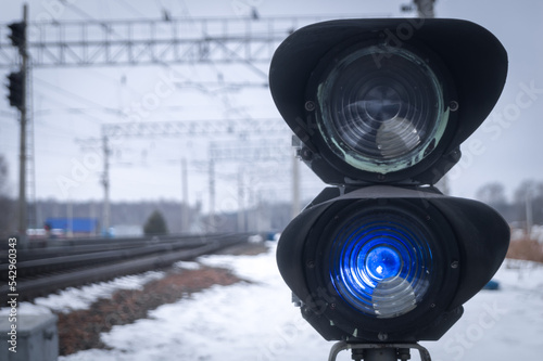 The shunting traffic light is blue on the railway. A special railway traffic light with a prohibitive signal turned on. Selective focus