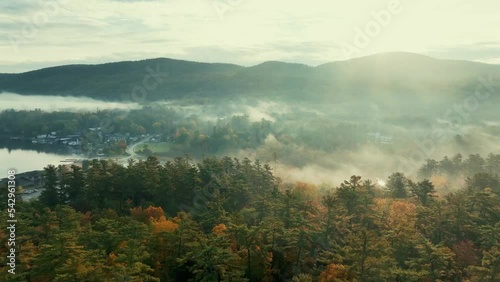 Autumn foliage aerial view in Lake George with morning fog photo