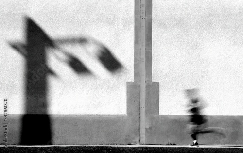 Runner and wall background, blurred motion, black and white