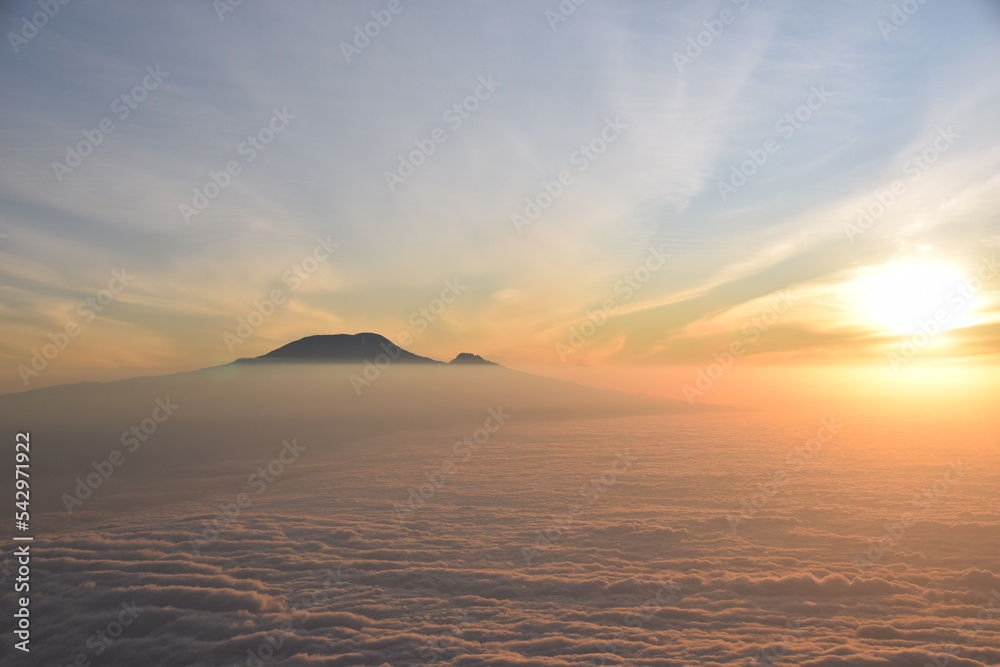 A view of Kilimanjaro at dawn from the summit of Mount Meru, 4562 m, the second highest mountain in Tanzania