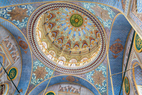 Dome and baroque interior painting inside Pertevniyal Valide Sultan Mosque in Laleli, Istanbul, Turkey (Turkiye). Ottoman mosque in gothic style. Art or architecture concept