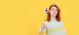 Woman isolated face portrait, banner with copy space. arrogance and selfishness. make a wish. fairy godmother. redhead woman in crown.