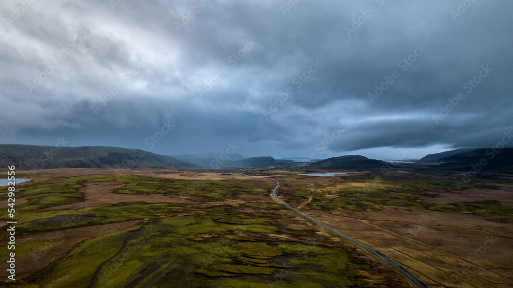 aerial view on iceland road with moss and mountains