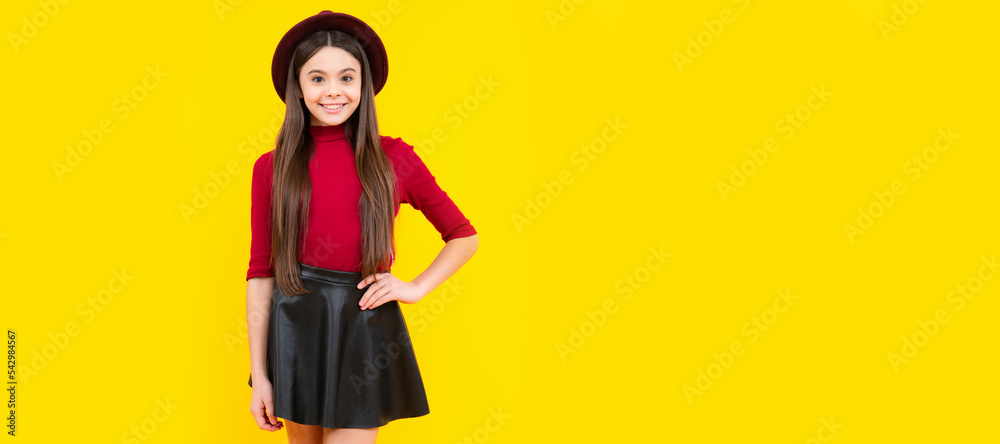 Teenager child girl casual clothes posing isolated on yellow background in studio. Child face, horizontal poster, teenager girl isolated portrait, banner with copy space. Teenager child girl casual clothes posing isolated on yellow background in studio. Child face, horizontal poster, teenager girl isolated portrait, banner with copy space.